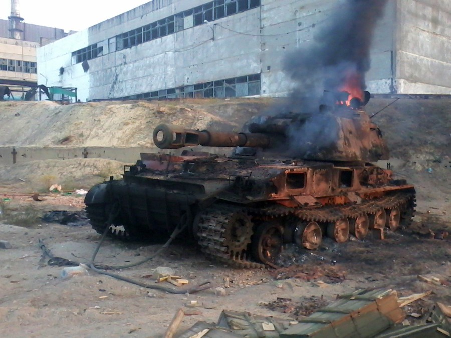 photo Burning ukraunian selfpropelled howitzer 2S3 in Lutugino