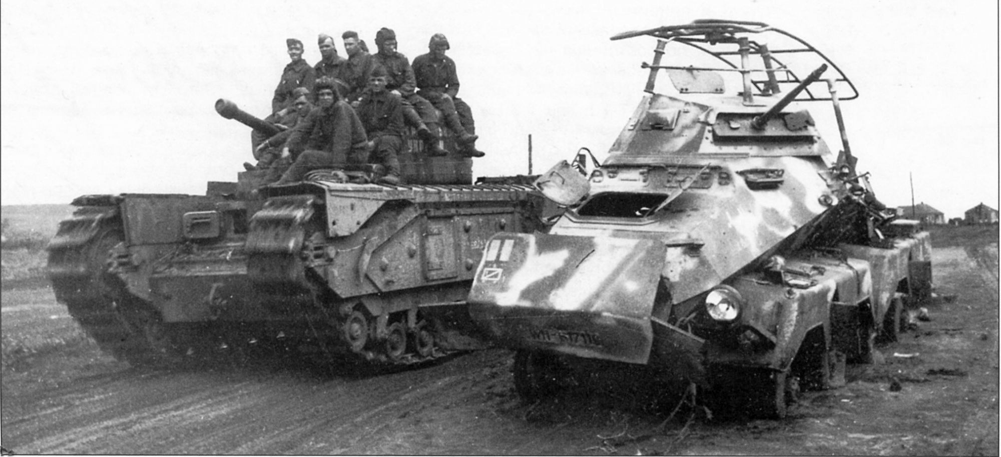wartime picture Churchill IV and knockedout Sdkfz232 