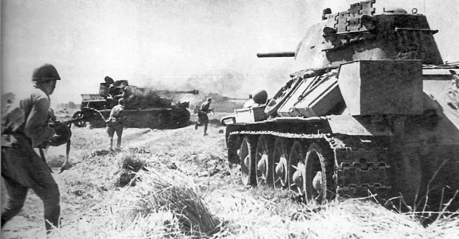 Soviet tank T34/76 and smoking panzers PzIV in 1943